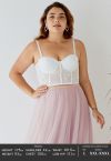 Crop top bustier brodé de fleurs en blanc