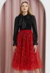 Jupe midi en tulle double épaisseur brodée de paillettes en rouge