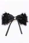 Pince à cheveux avec nœud papillon flou et strass en forme de cœur en noir