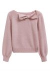 Pull en tricot à col bateau avec bordure en nœud papillon en rose