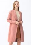 Manteau chic en tricot ouvert sur le devant en corail