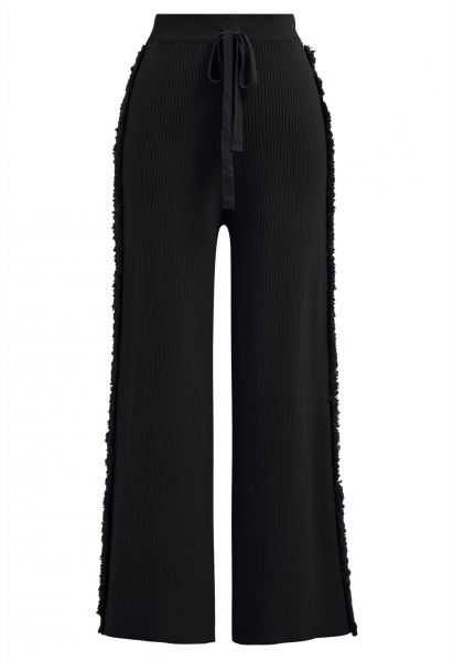 Pantalon en tricot à jambe droite avec franges latérales en noir
