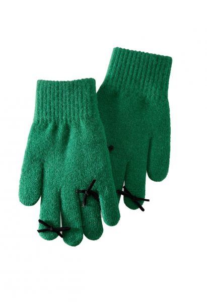 Gants en tricot avec trou pour les doigts et décoration avec nœud papillon en vert