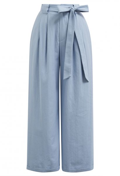 Pantalon large plissé avec ceinture à nœud papillon en bleu