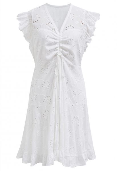 Mini-robe brodée à œillets et cordon de serrage sur le devant, en blanc