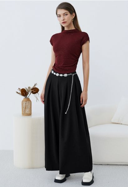 Pantalon Palazzo plissé orné de chaînes en noir