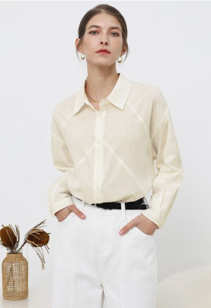 Chemise boutonnée en coton à empiècements géométriques couleur crème