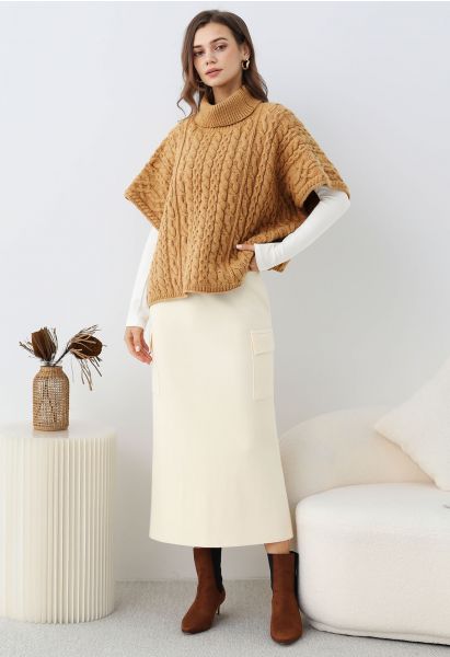 Jupe en tricot élégante avec fausses poches et lien à la taille, couleur crème