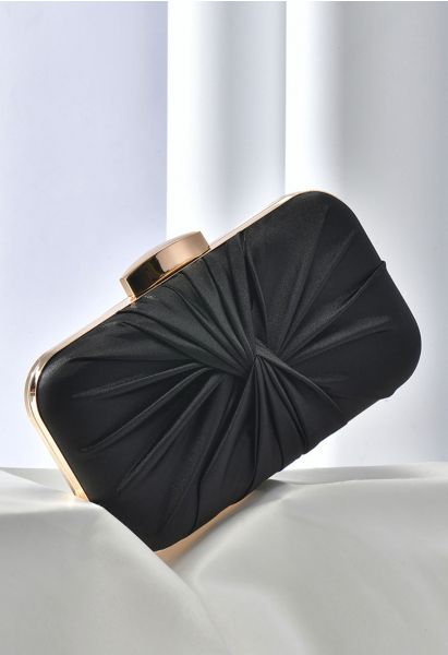 Pochette en satin froncé et noué en noir