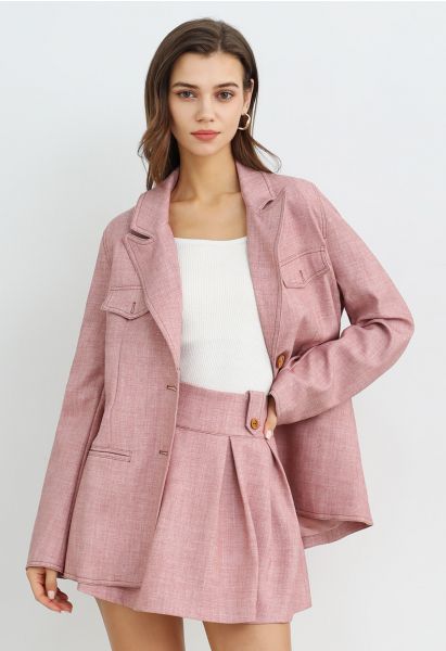 Blazer boutonné à revers pointus et poches décoratives en rose