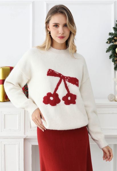 Ravissant pull en tricot à épaules tombantes avec nœud papillon et cerises