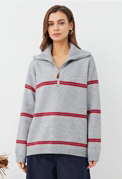 Pull en tricot à rayures sportives et col zippé en gris