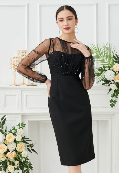 Robe mi-longue glamour à décor de perles et maille épissée en noir