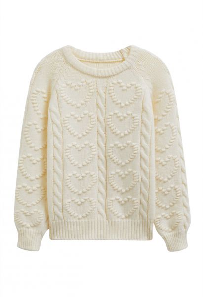 Pull en maille torsadée avec motif cœur en relief en crème