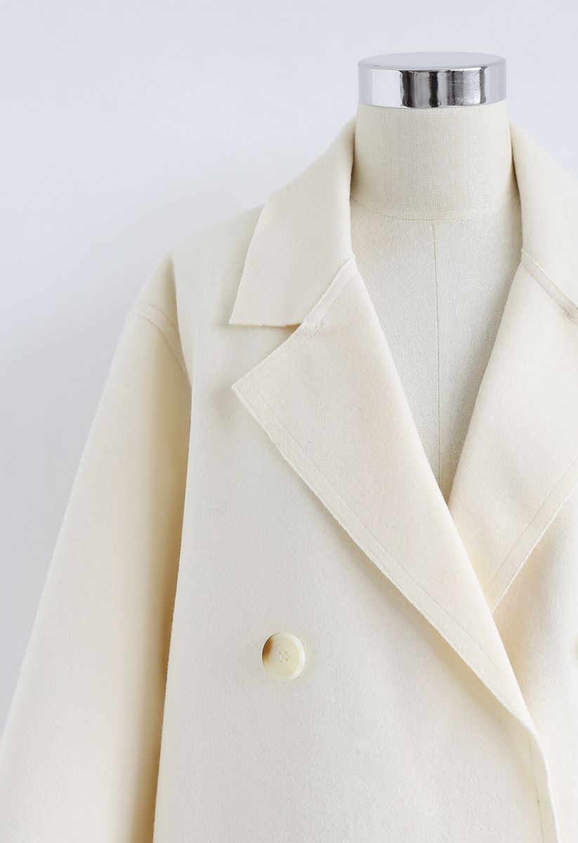 Manteau en laine mélangée à double boutonnage en crème
