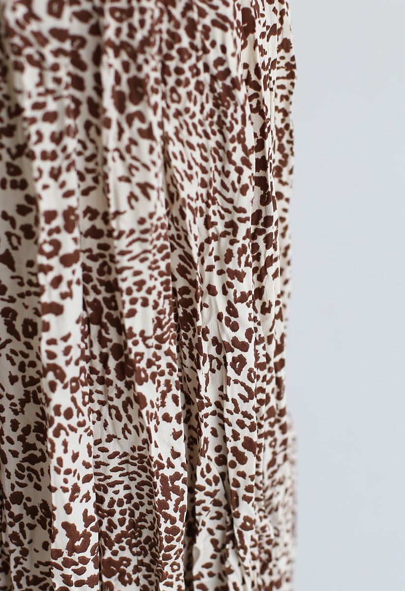 Jupe mi-longue plissée à imprimé léopard en marron