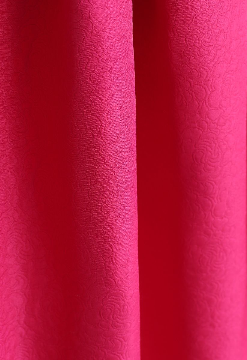 Jupe mi-longue trapèze plissée en jacquard rose vif