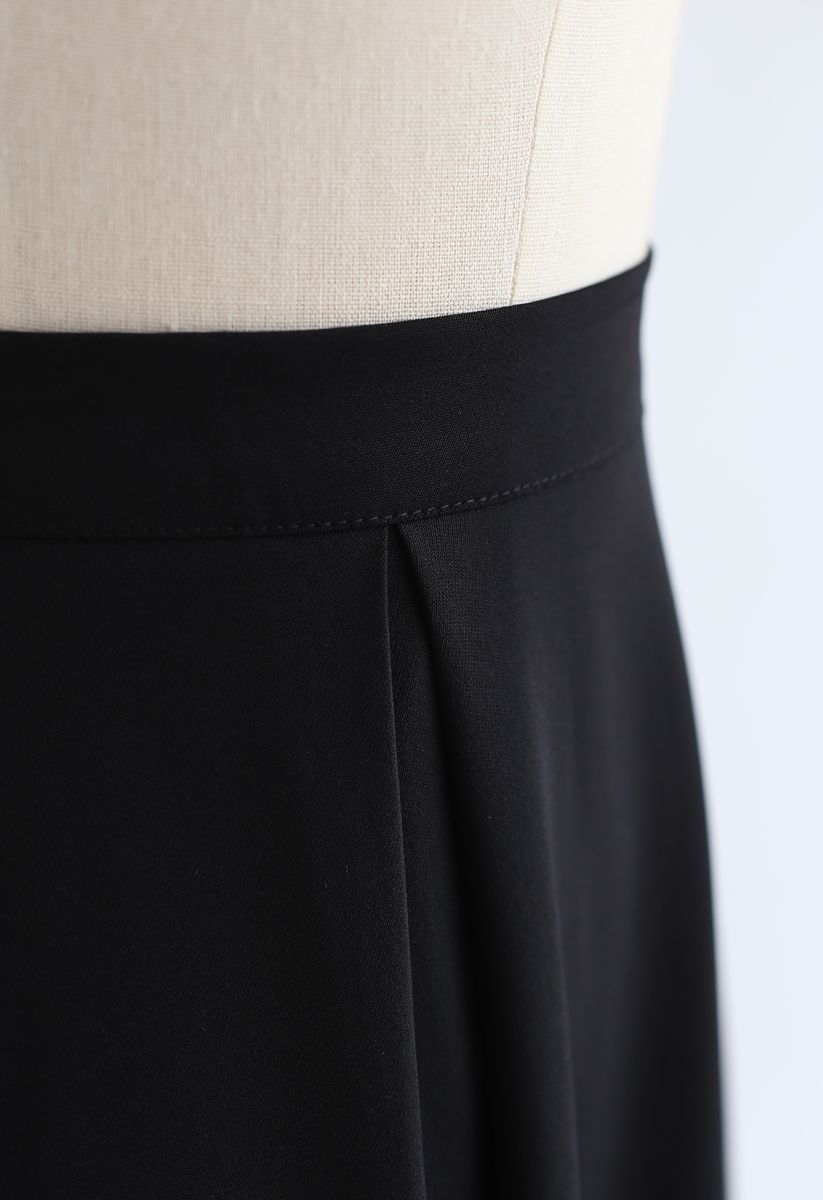 Jupe mi-longue plissée A-Line zippée sur le côté en noir