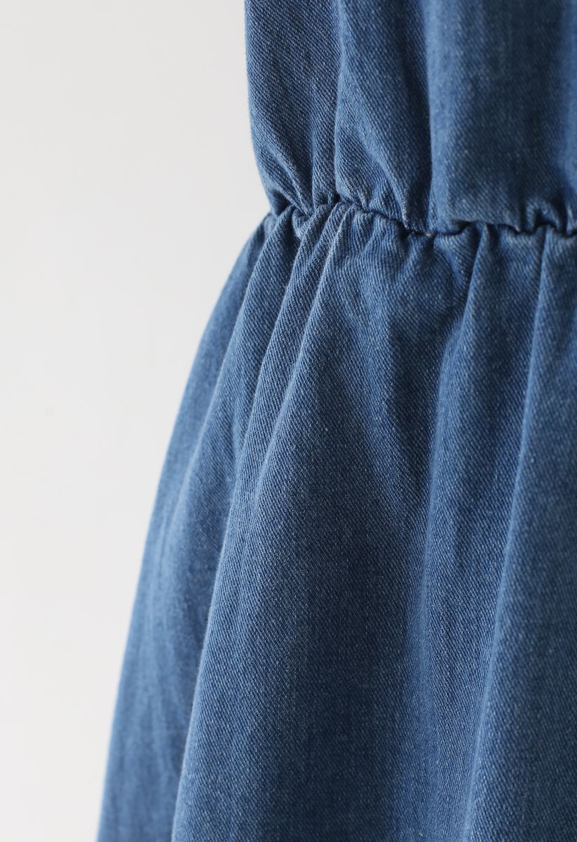 Robe mi-longue en jean Hi-Lo à taille ouverte en bleu