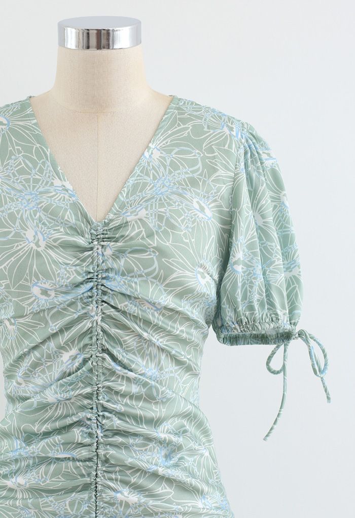 Robe mi-longue à imprimé floral et poignets à cordon de serrage en vert