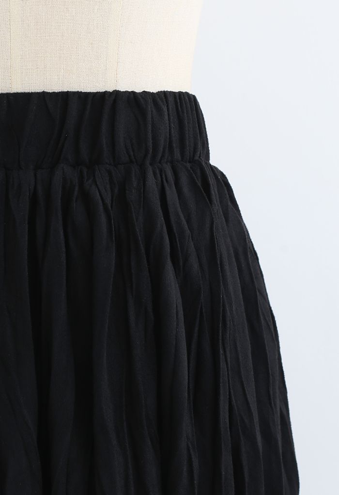 Jupe mi-longue trapèze plissée en velours noir en noir