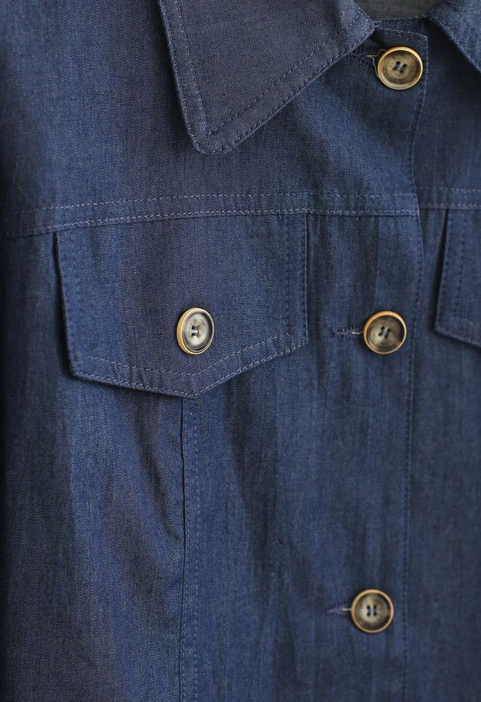 Veste courte en jean boutonnée plissée à manches bouffantes en bleu marine