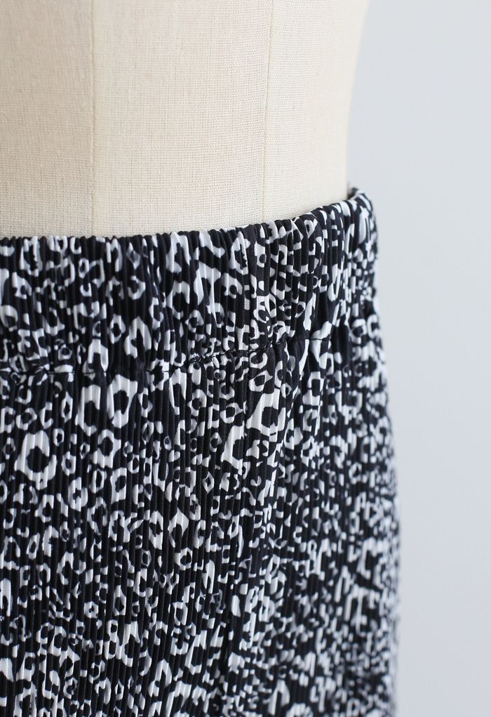 Pantalon large fendu plissé à imprimé animal en noir