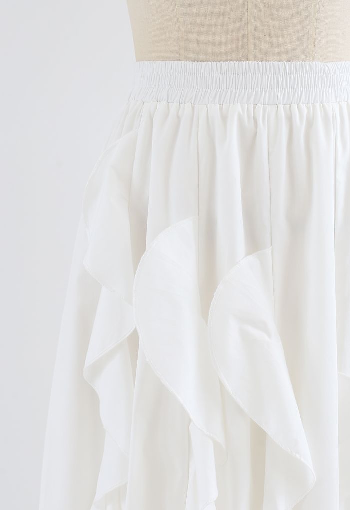 Jupe mi-longue en coton coupe trapèze à volants en blanc