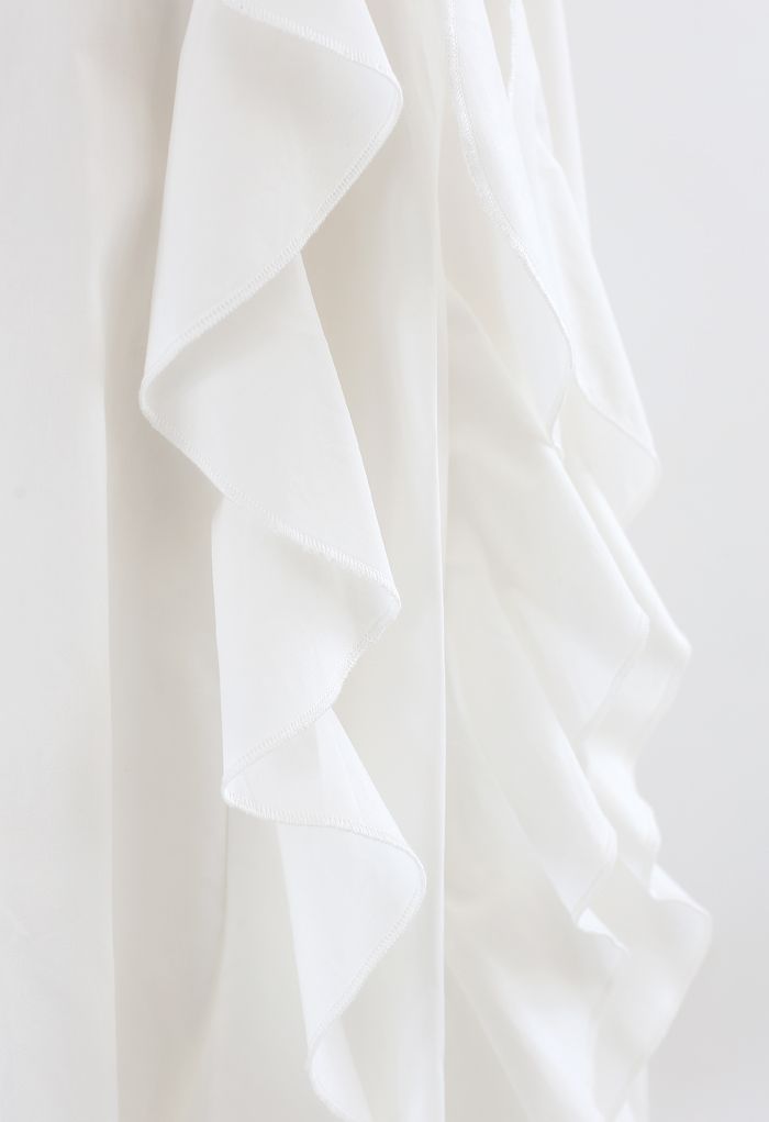 Jupe mi-longue en coton coupe trapèze à volants en blanc