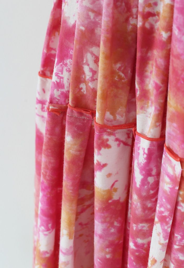 Jupe mi-longue plissée à volants tie-dye en rose vif