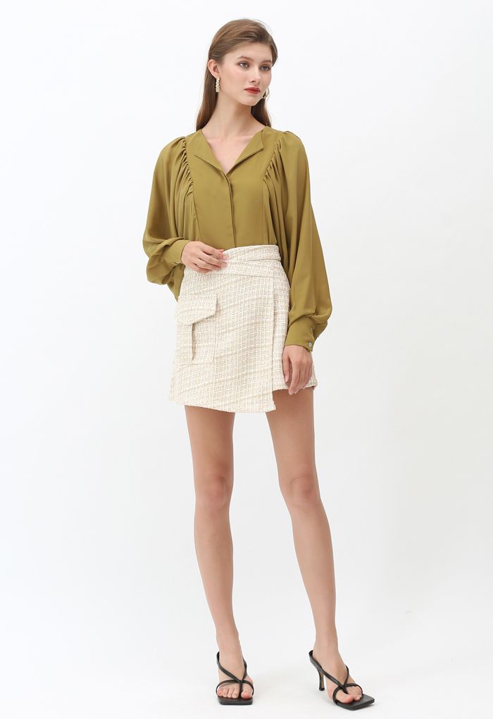 Mini jupe asymétrique en tweed jaune clair