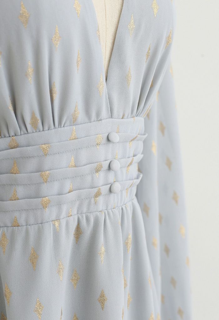 Robe mi-longue en mousseline de soie plissée à imprimé losanges dorés