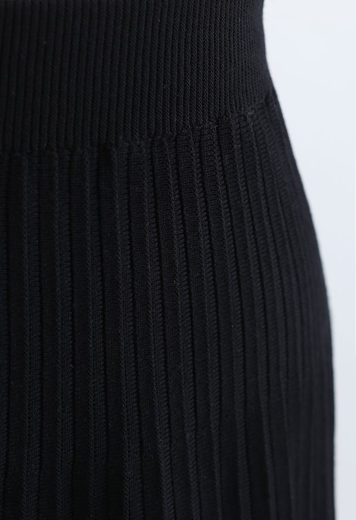 Jupe mi-longue en maille plissée à bordure en dentelle en noir