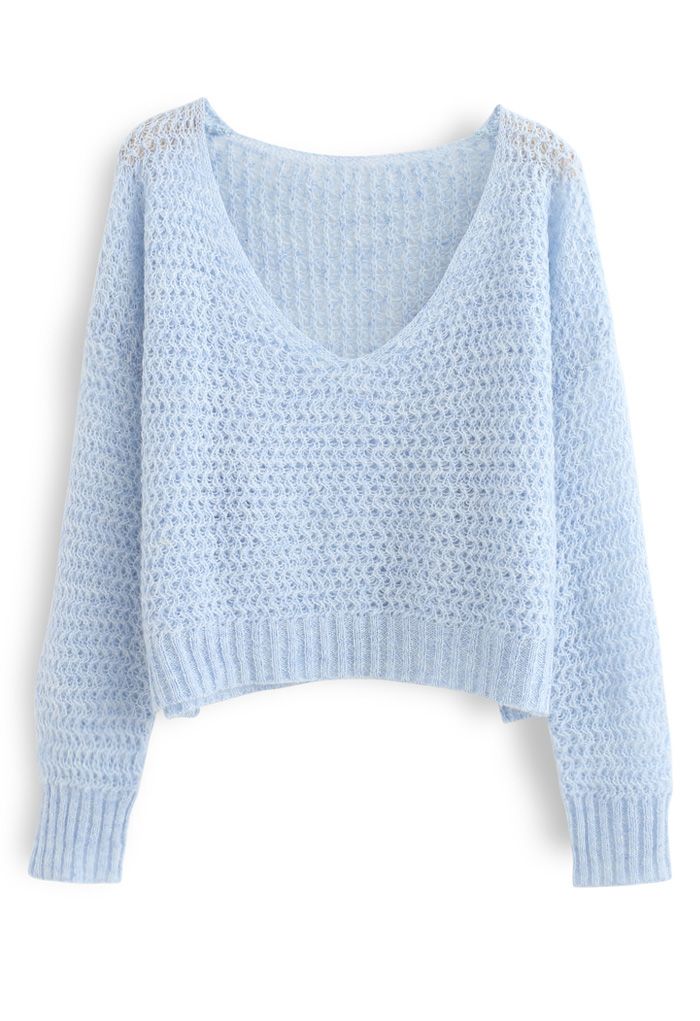 Pull court évidé en tricot moelleux en bleu