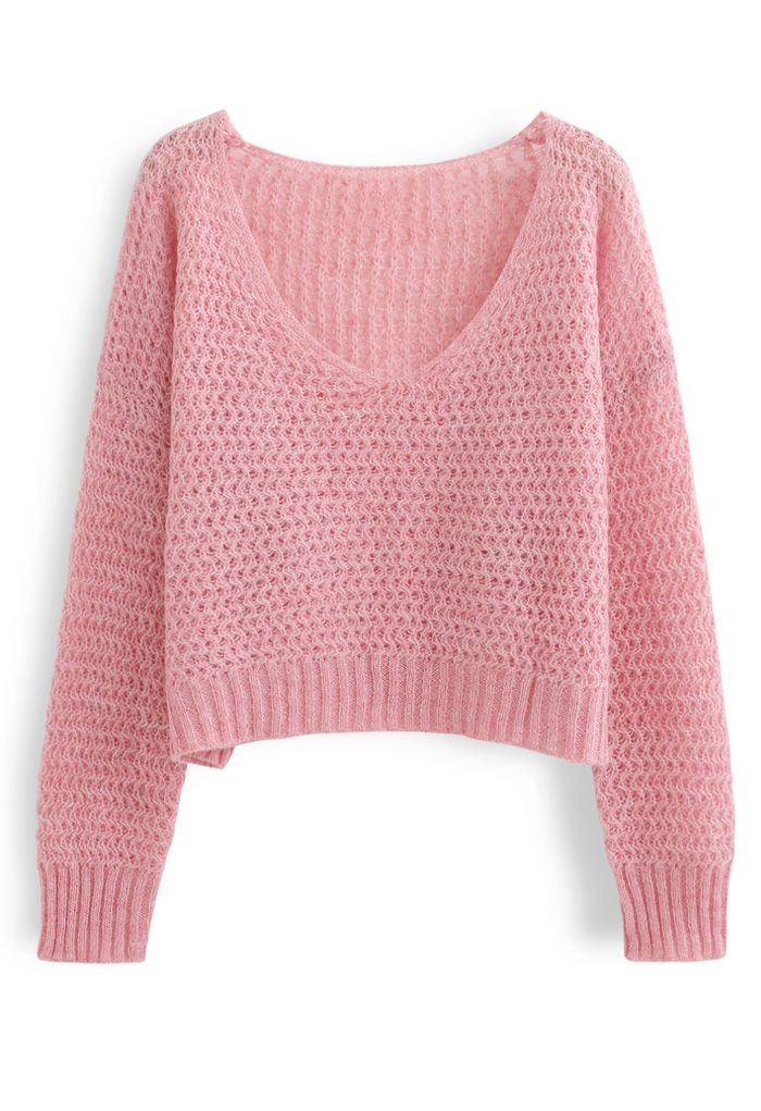 Pull court évidé en tricot moelleux en rose