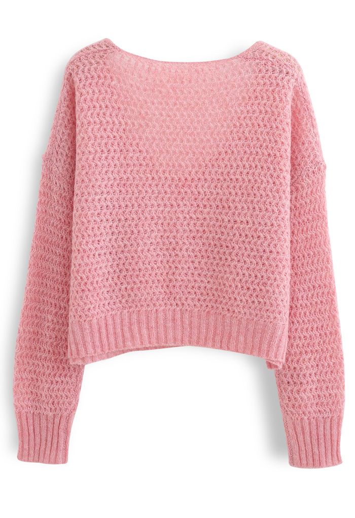 Pull court évidé en tricot moelleux en rose