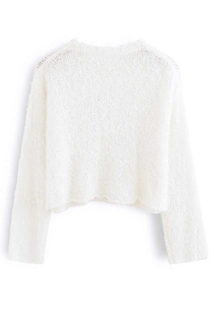 Pull court en tricot moelleux évidé en blanc