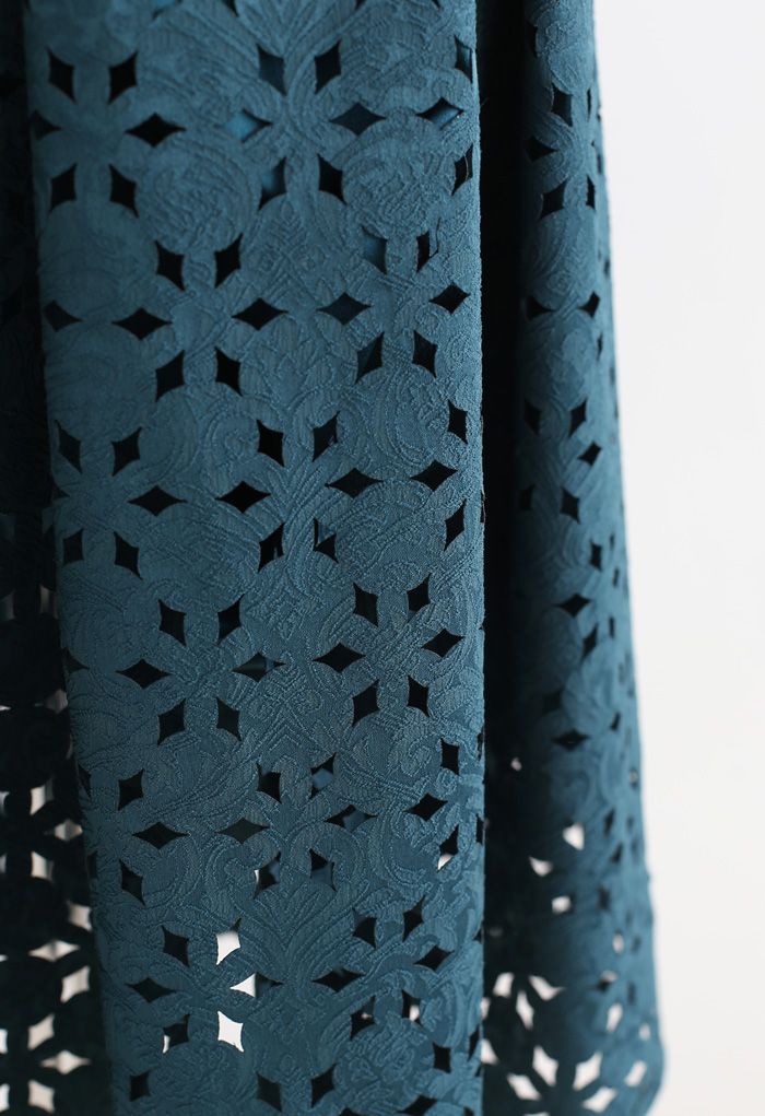 Jupe plissée en jacquard à découpes de flocons de neige en bleu sarcelle