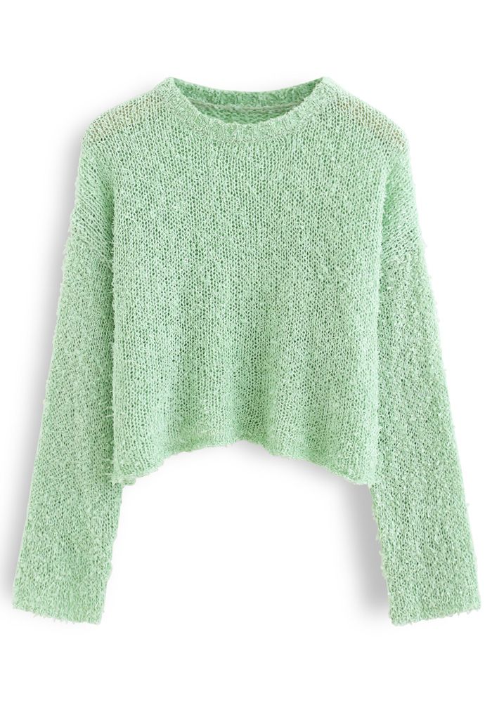 Pull court en tricot moelleux évidé en vert pois