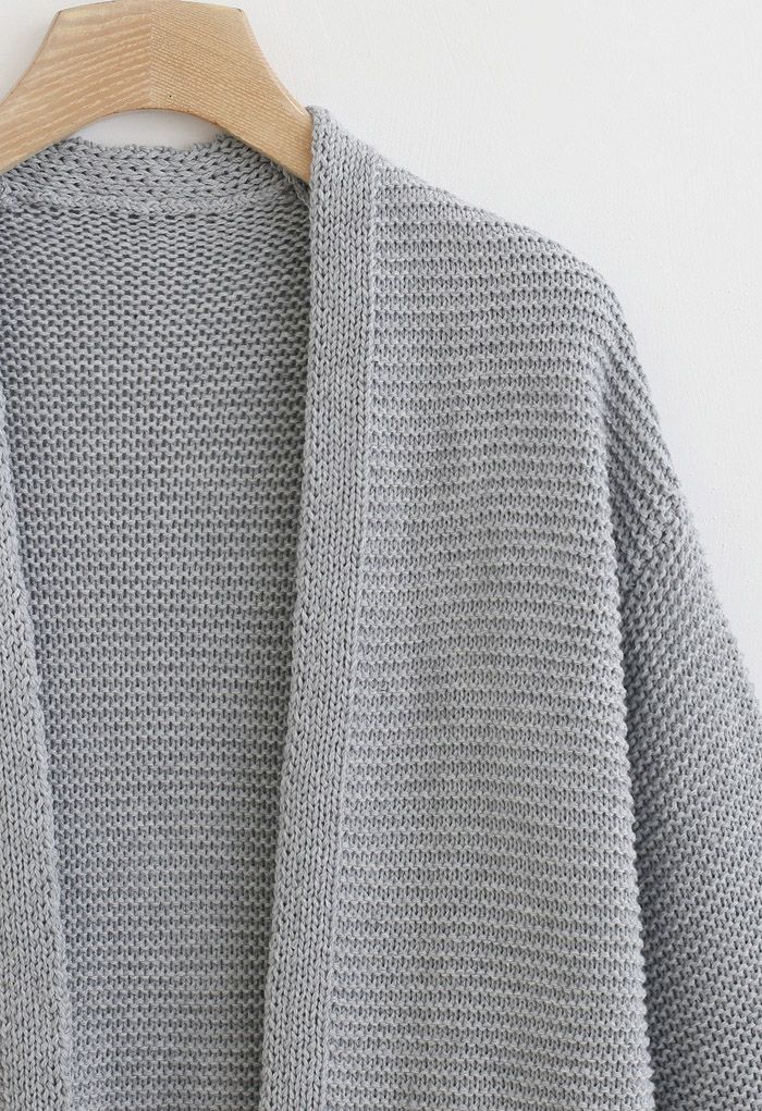 Cardigan en tricot à poches basiques ouvert sur le devant en gris