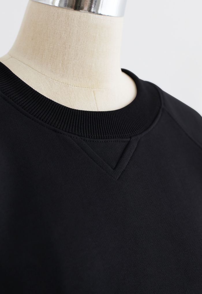 Robe sweat-shirt dos ouvert en noir