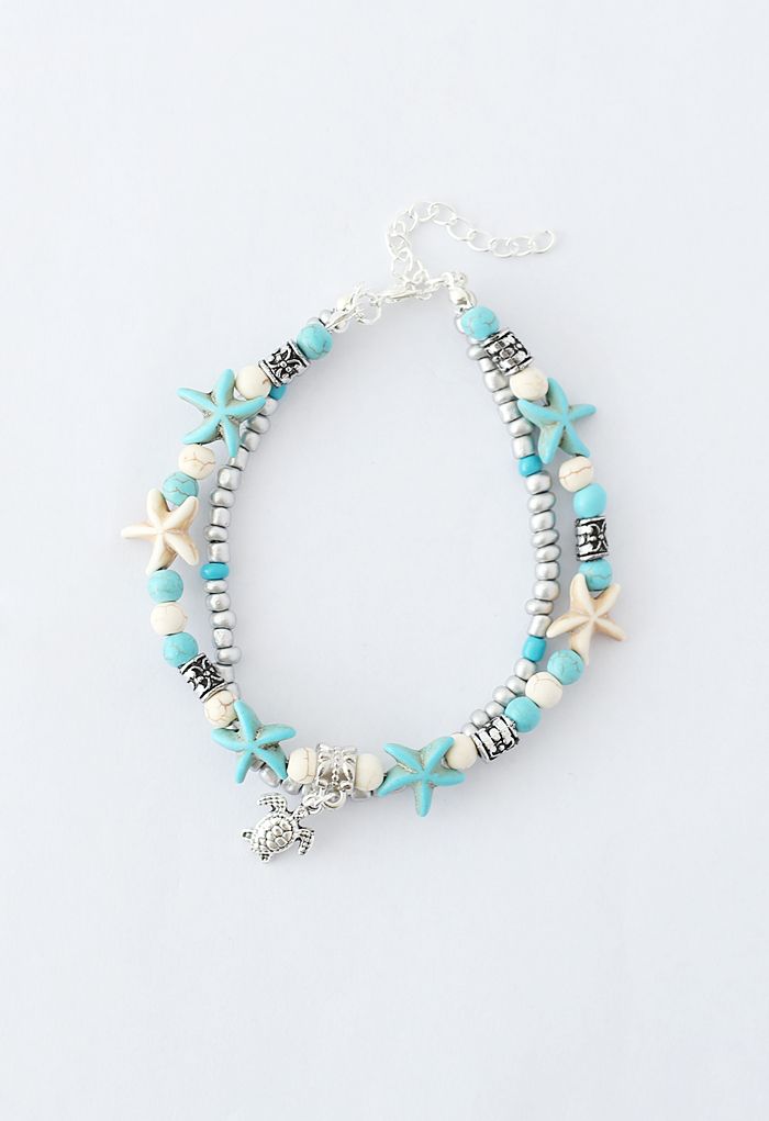 Bracelet de perles d'étoiles de mer bleues superposées