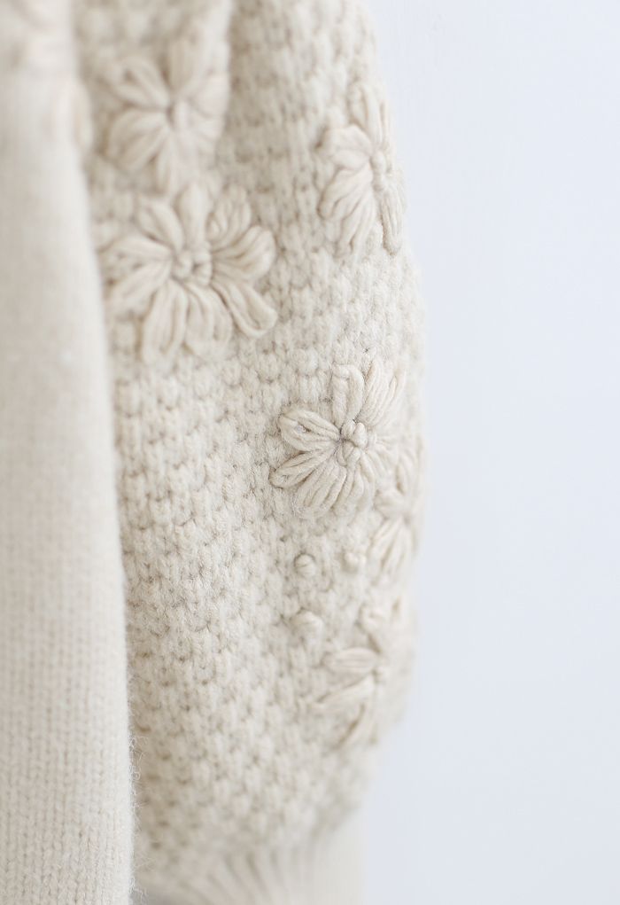Pull en tricot à manches bouffantes et fleurs