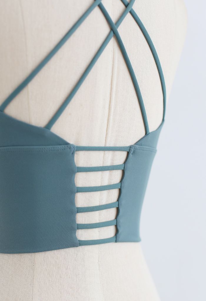 Soutien-gorge de sport court à bretelles Crisscross en bleu poussiéreux