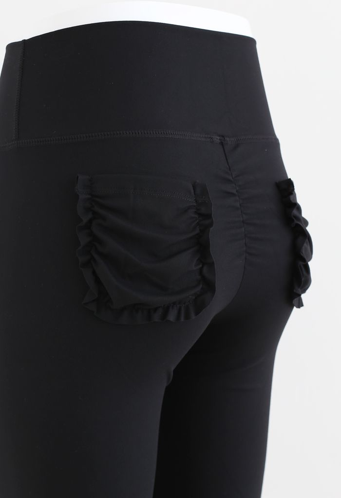 Ensemble soutien-gorge de sport à lacets et leggings avec poches en noir