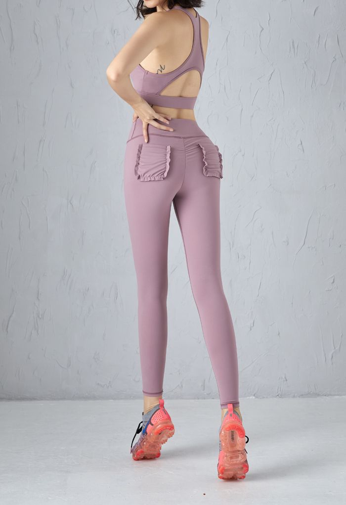 Soutien-gorge de sport à lacets sur le devant et leggings avec poches en violet