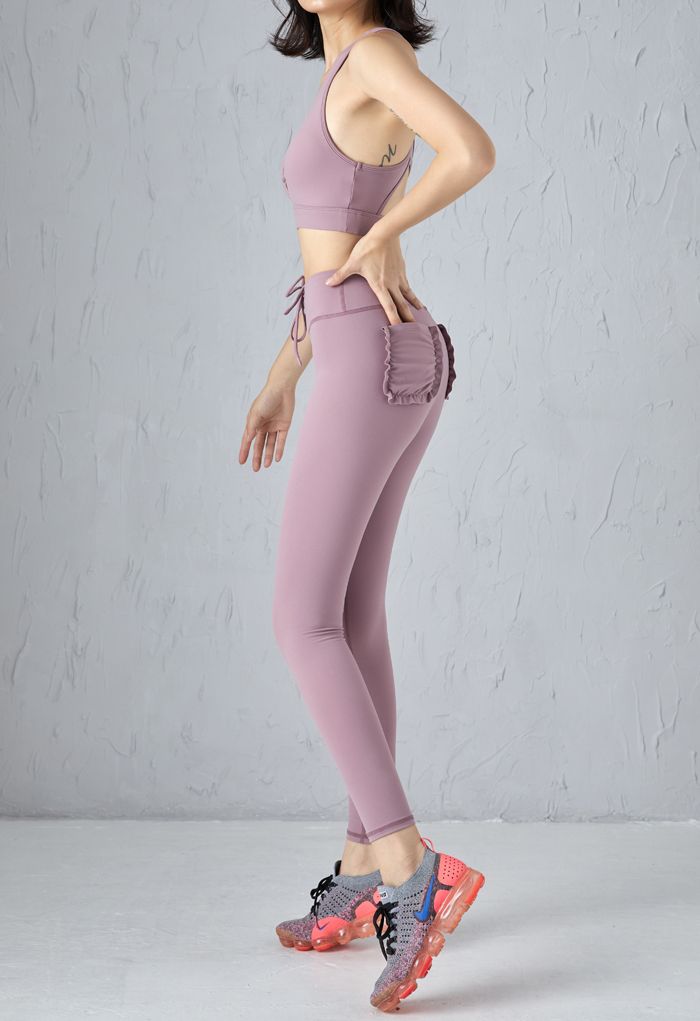 Soutien-gorge de sport à lacets sur le devant et leggings avec poches en violet