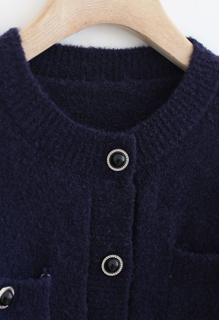 Cardigan en tricot moelleux boutonné avec poche en bleu marine