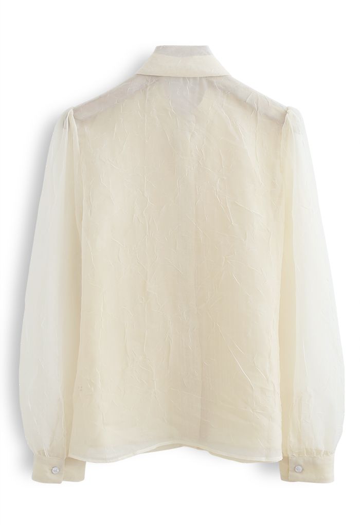 Chemise boutonnée transparente à nœud papillon en crème