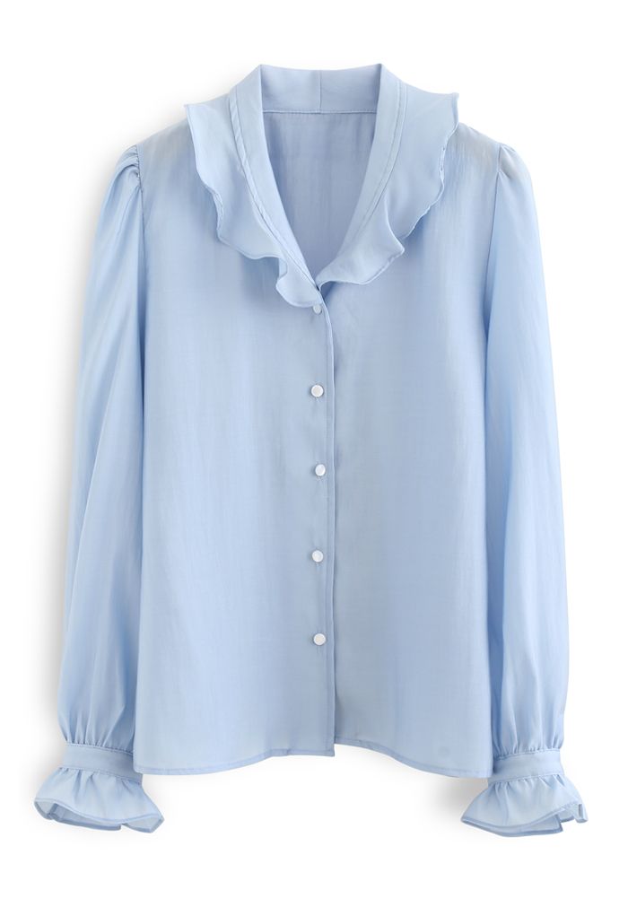 Chemise boutonnée à volants semi-transparents en bleu